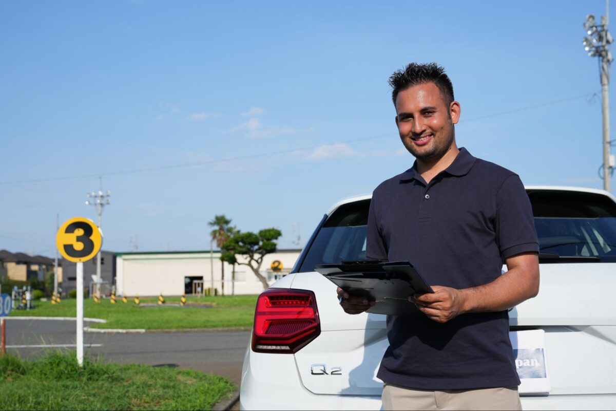 Driving camp instructor ready to teach a student