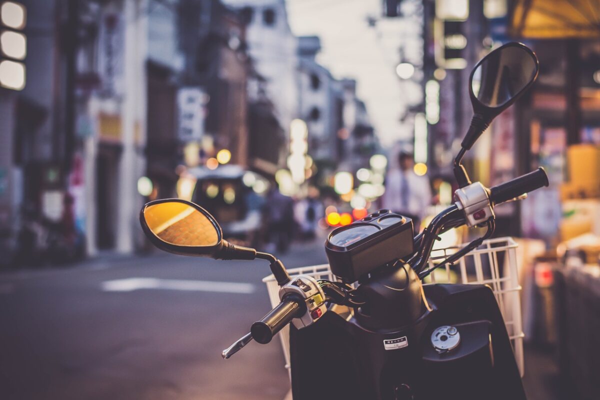 Motorcycle parked on the side of a Japanese road