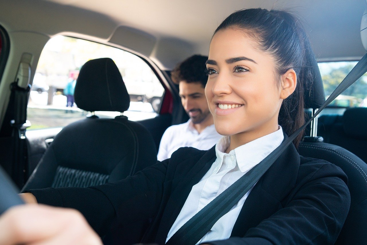 A female rideshare driver in Japan with passenger