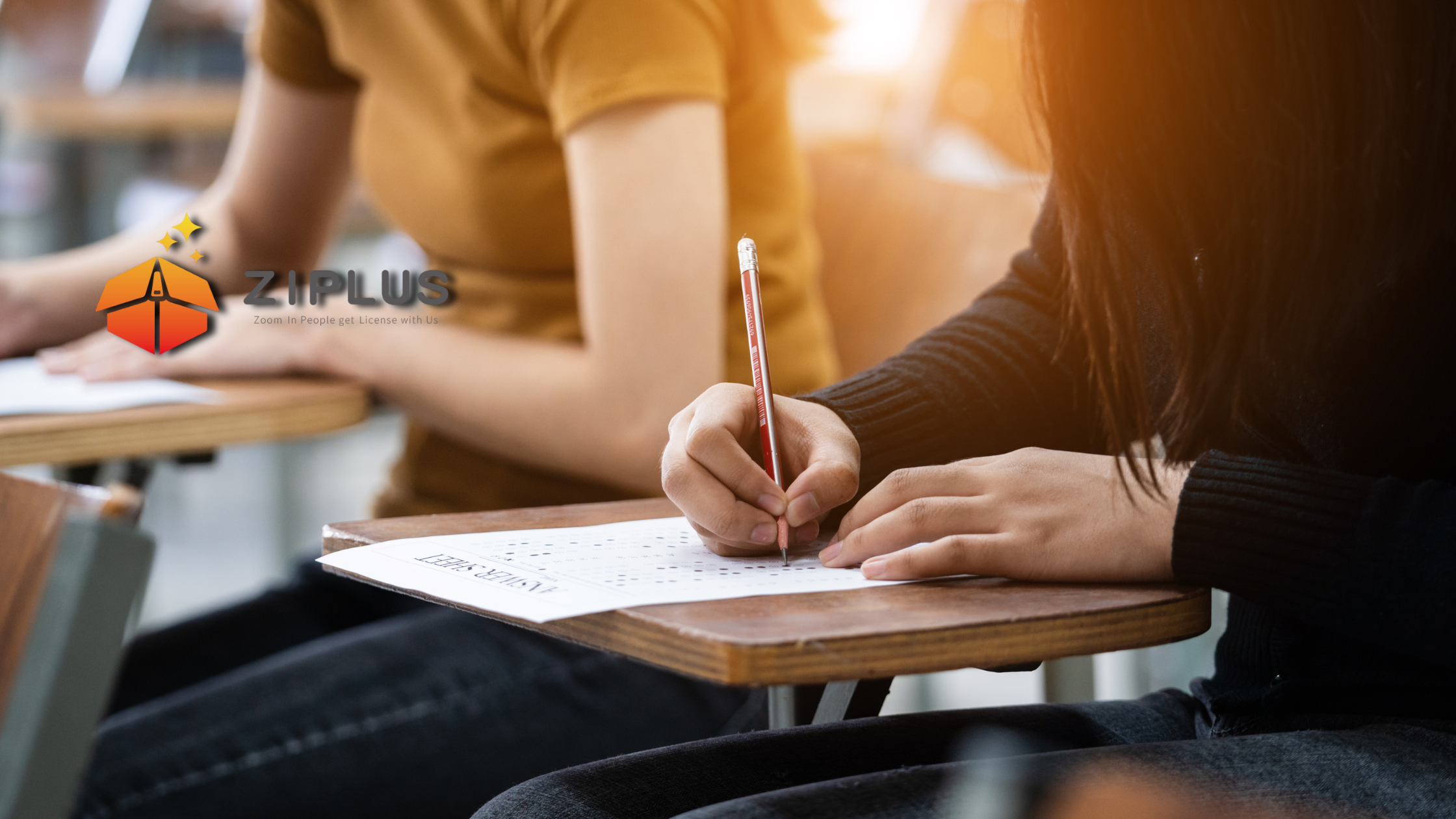 Test takers taking the new gaimen kirikae written test